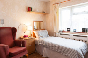 Bedroom with red chair