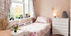 Bedroom with floral bedspread