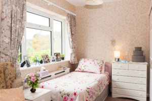 Bedroom with floral bedspread